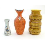 Three West German vases, comprising a Jasba Keramik vase with an orange crackle glaze, a mustard
