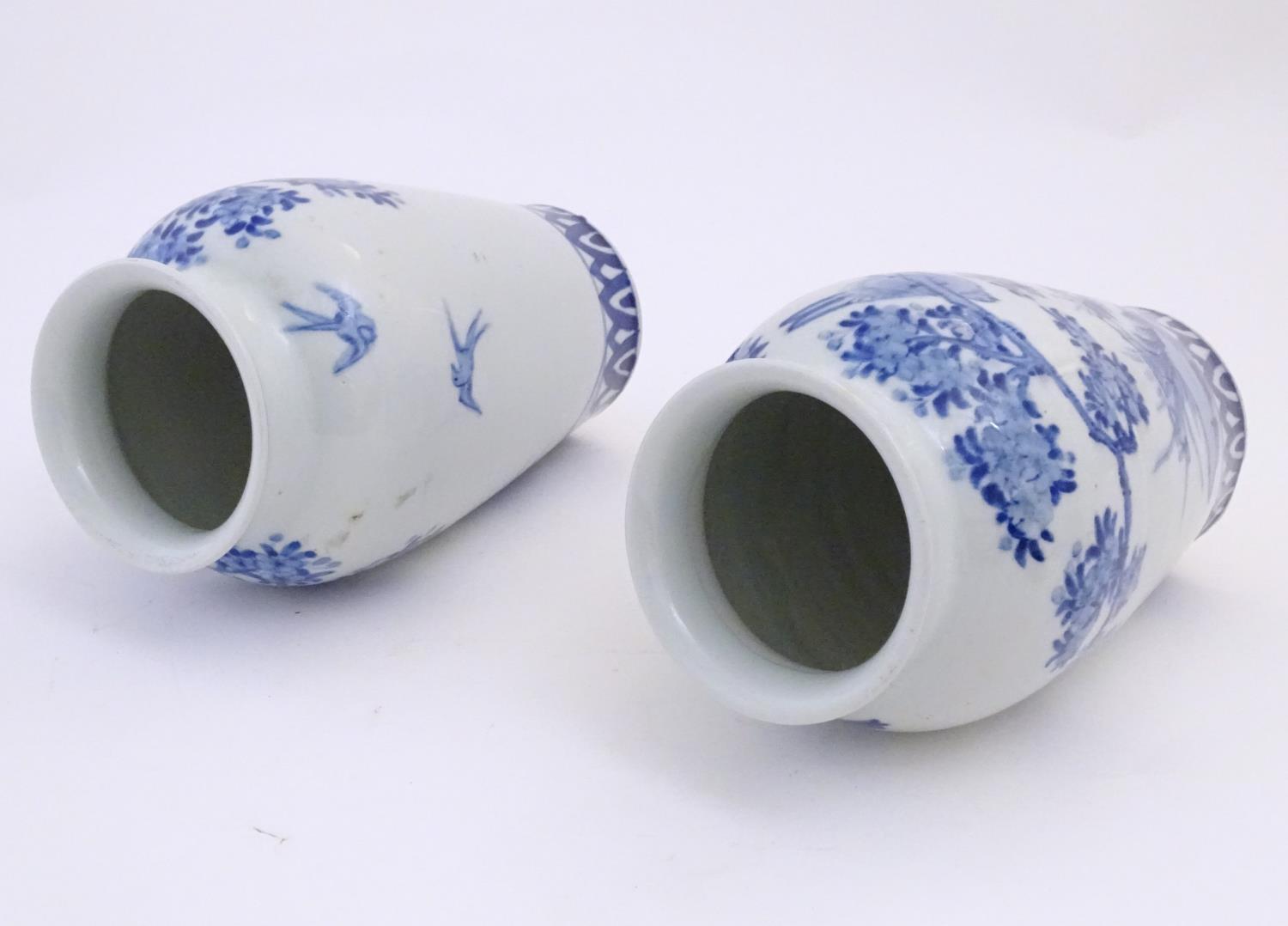 Two Chinese blue and white vases decorated with landscape scene with birds and trees. Approx. 9 3/4" - Image 6 of 6