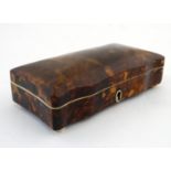 A 19thC tortoiseshell box with velvet lining and squat bun feet. 1 3/4" x 6" x 3" Please Note - we