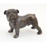 A 20thC cast model of a standing dog / bulldog. Approx. 6 1/2" high Please Note - we do not make