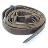A Victorian equestrian / horse leather girth strap. Approx. 95" long Please Note - we do not make