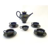 A quantity of Kahler Keramik Danish studio pottery tea wares, comprising a teapot and four cups