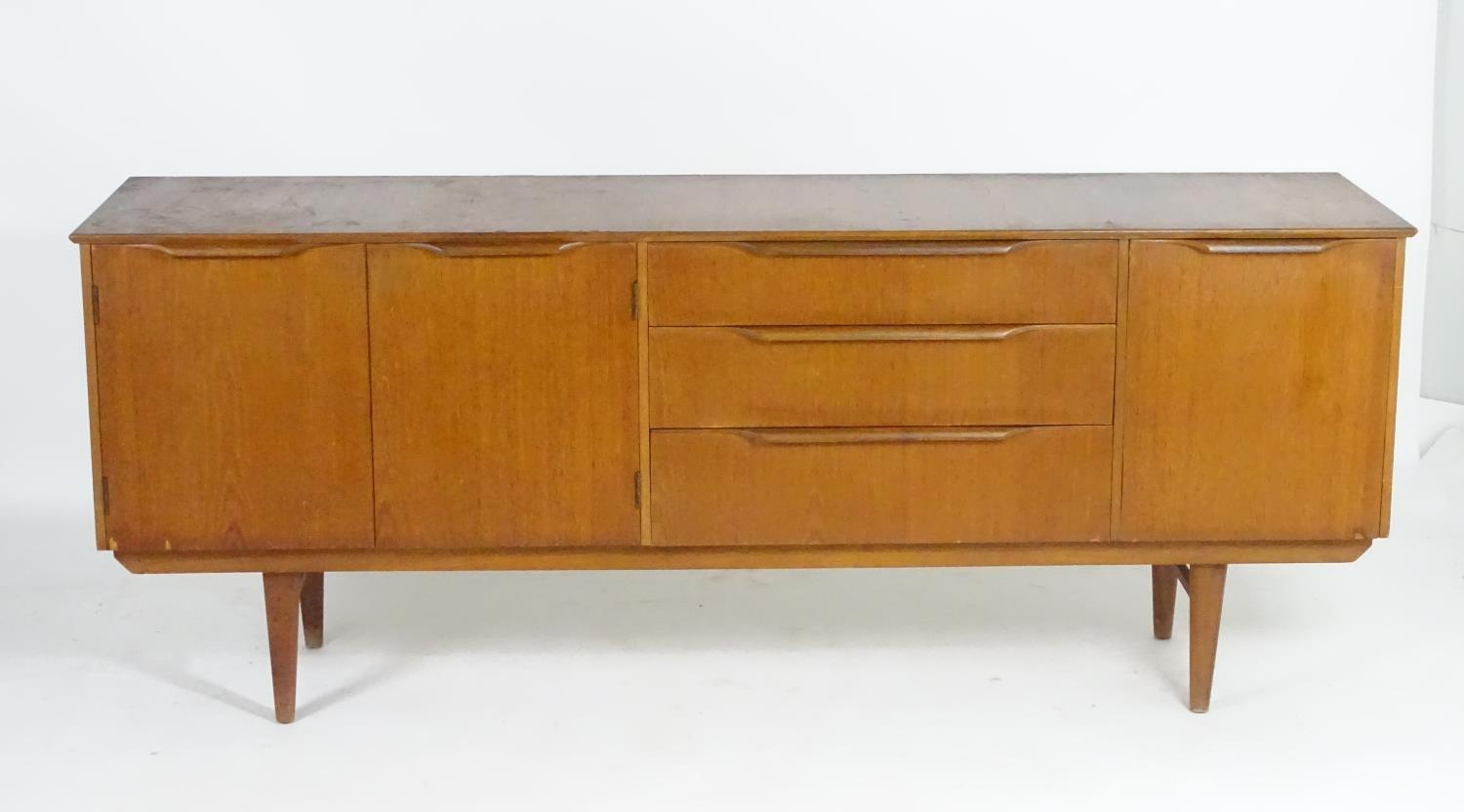 Vintage retro, mid-century: a1960s British made teak sideboard, composed of three compartments