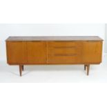 Vintage retro, mid-century: a1960s British made teak sideboard, composed of three compartments