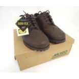 Sporting / Country pursuits: A pair of Musto, Gore-Tex brogues in dark brown, UK size 5, new with