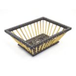 A late 19thC Anglo-Indian ebonised wood and porcupine quill basket of rectangular form with inlaid