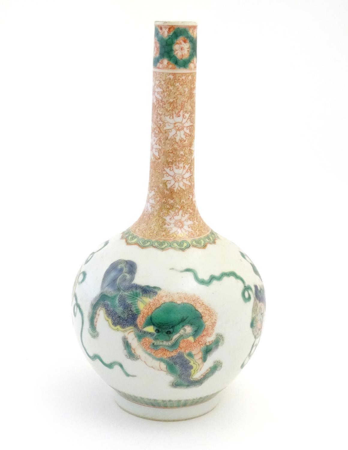 A Chinese bottle vase decorated with stylised foo dogs / dragons. The neck with floral and foliate - Image 5 of 7