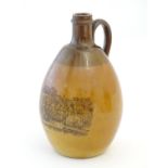 A Doulton Lambeth stoneware bottle vase with a single handle decorated with a view of Dunkeld