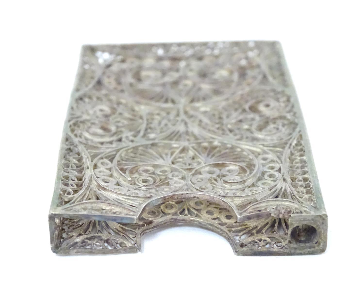A white metal card vase with filigree decoration . 3" long Please Note - we do not make reference to - Image 5 of 6