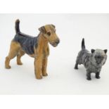 Two Royal Doulton models of dogs comprising an Airedale Terrier, no. HN 1023, and a Cairn Terrier,