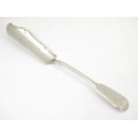 A silver fiddle pattern butter knife hallmarked Exeter 1881, maker John Pope Genge. 7 3/4" long