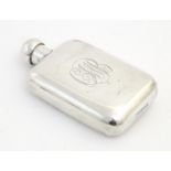 A silver hip flask hallmarked London 1903, maker Mappin & Webb Ltd. Approx. 5" high Please Note - we