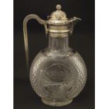 Manner of Thomas Webb : A Victorian cut glass and silver mounted claret jug, the body of the jug