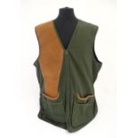 Sporting / Country pursuits: A Musto skeet vest / clay shooting gilet in green. Size XXL, new with