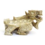 A Chinese carved soapstone model of a mythological dragon turtle with incised detail. Approx. 3 1/2"