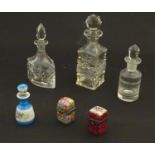 Assorted glass scent bottes together with together with two perfume / scent bottle in enamel