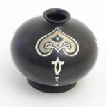 A small black Shelley vase with silver and white Art Nouveau style decoration. Makers mark stamped