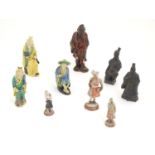 A quantity of assorted figures, to include four Chinese mud man figures, a replica Terracotta