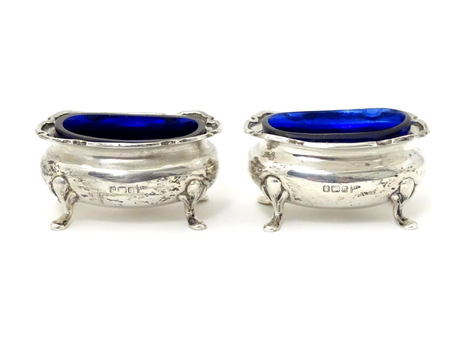 A pair of silver salts with blue glass liners, hallmarked Sheffield 1908 maker Walker & Hall. 2 1/2" - Image 4 of 7