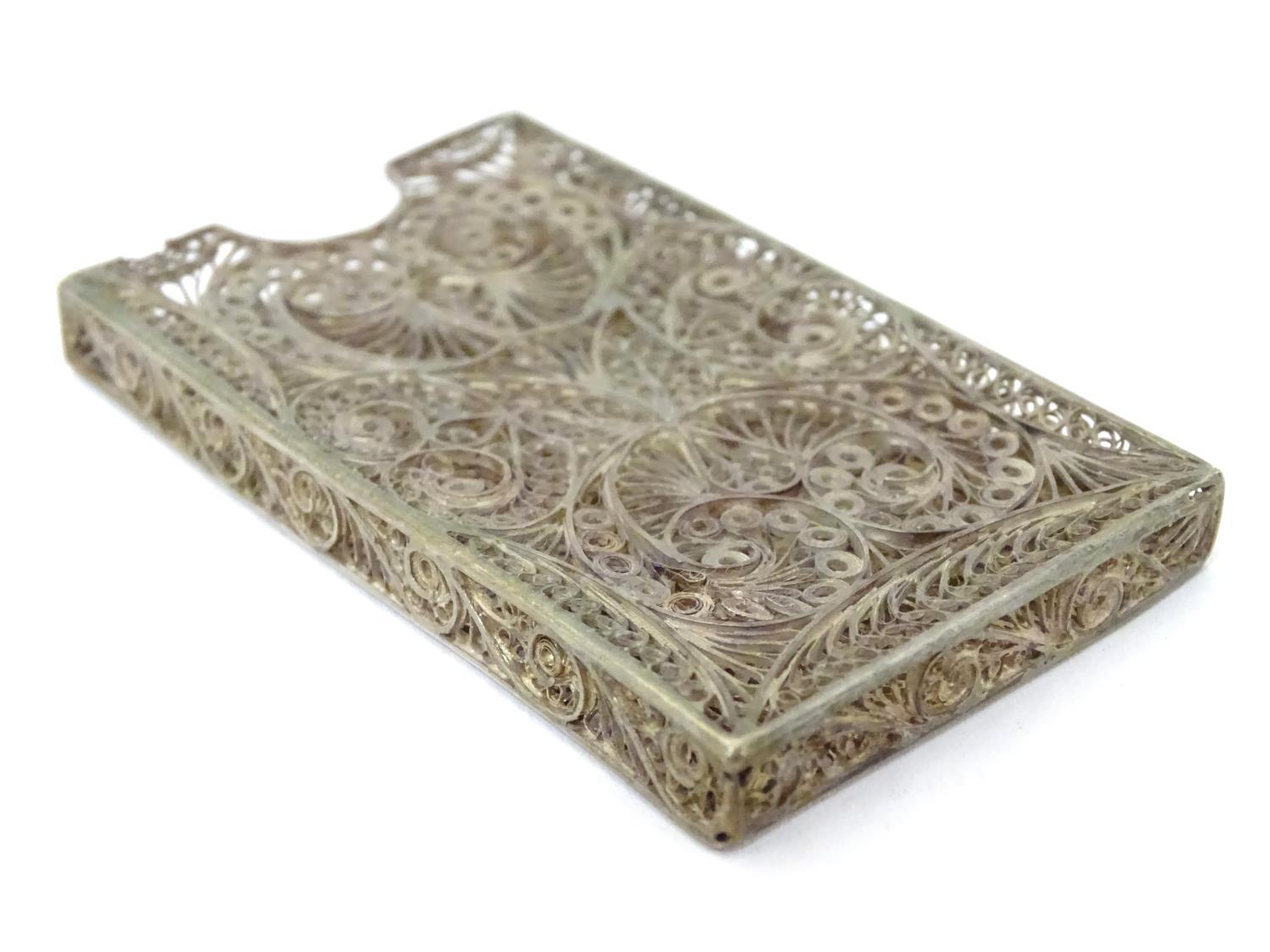 A white metal card vase with filigree decoration . 3" long Please Note - we do not make reference to - Image 6 of 6