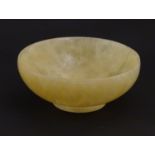 An Oriental hardstone bowl. Approx. 1 3/4" high x 4 1/2" diameter Please Note - we do not make