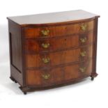 A mid / late 19thC mahogany bow fronted chest of drawers, comprising four long drawers with
