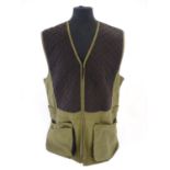 Sporting / Country pursuits: A Laksen skeet vest / clay shooting gilet in green. Size 2XL, new