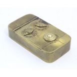 A 19thC brass combination snuff box with two Roman numeral dials and a button lever. Approx. 3/4"