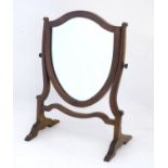 An early 20thC mahogany toilet / skeleton mirror. 14 1/2" wide x 19 1/2" high. Please Note - we do
