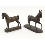 A Border Fine Arts cast model of a horse, together with another. Largest approx. 7 1/4" high (2)