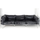 A mid 20thC Le Corbusier Grande Comforte sofa, with a chromed frame and feather filled cushions.