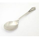A silver jam / preserve spoon with fretwork decoration to handle, hallmarked Sheffield 1933 maker
