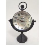 A mid 20thC Wehrle Mayflower magnified sphere ball clock, 4 3/4" tall, the face 2" in diameter