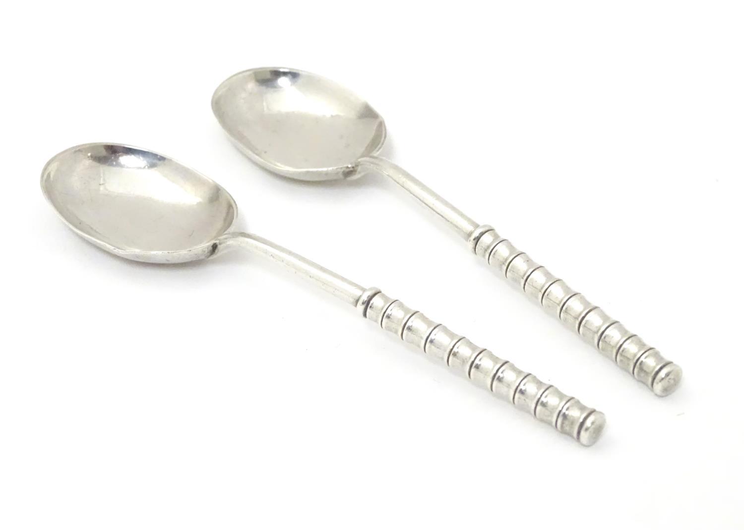 A pair of Victorian Scottish silver teaspoons with unusual handles with stylised bamboo detail,