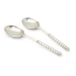 A pair of Victorian Scottish silver teaspoons with unusual handles with stylised bamboo detail,