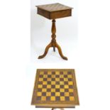A late 19thC walnut games table, with a folding games board top opening to reveal small drawers