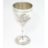 A Victorian silver cup of goblet / chalice form. Hallmarked London 1874. 8" high Please Note - we do