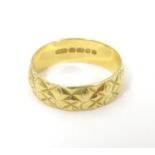 An 18ct gold ring (approx 3g ). Ring size K 1/2. Please Note - we do not make reference to the