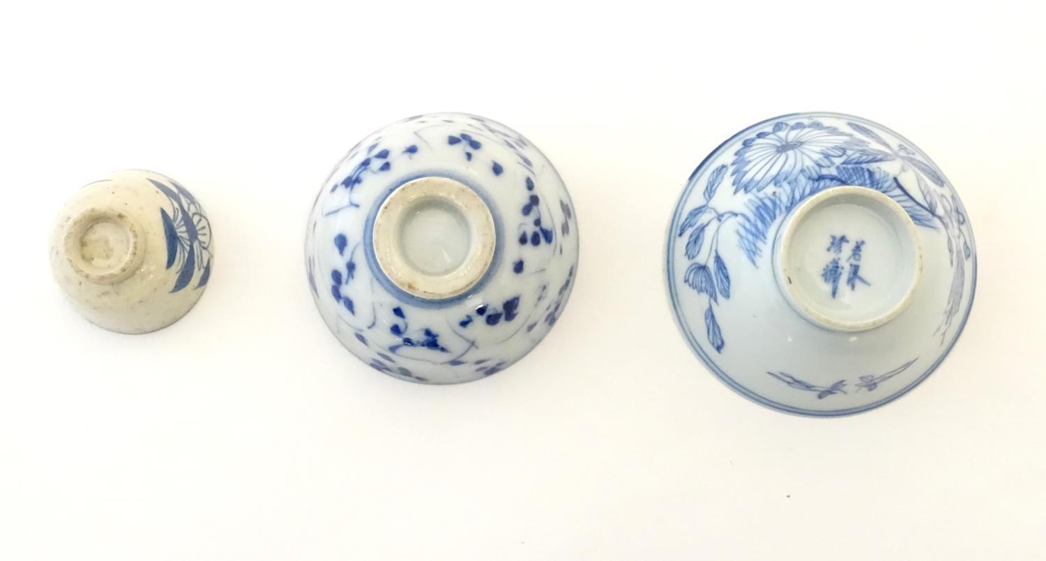 Three assorted Oriental blue and white wares to include sake cup, tea bowls etc. Character marks - Image 4 of 12