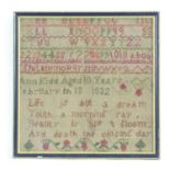 An early 19thC sampler / embroidery / needlework by Ann Kidd, Aged 10 Years, February 13 1832.