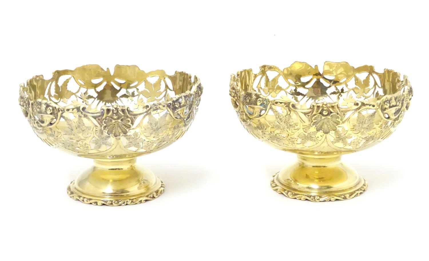 A pair of silver gilt pedestal bon bon dishes, hallmarked Birmingham 1915, maker George Nathan &