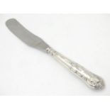 A silver butter knife with Kings Pattern handle, hallmarked Sheffield 1971, maker Harrison Brothers.