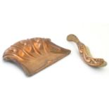 An Art Nouveau copper crumb scoop and brush with repousse decoration, marked Beldray under. Brush