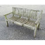 Garden & Architectural, Salvage: a teak three seater garden bench by Kingsley Smythe, 63 3/8"
