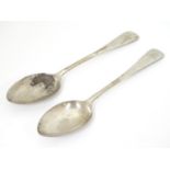 A pair of Victorian silver teaspoons hallmarked Sheffield 1884, maker Walker & Hall (John Edward