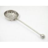 A silver sifter / straining spoon, hallmarked Birmingham 1892, maker Hilliard & Thomason. 4 3/4"