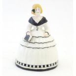 A Royal Worcester crinoline lady. Marked under no. 2621. Approx. 4 3/4" high Please Note - we do not