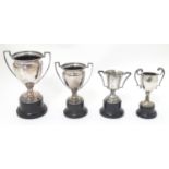 4 assorted silver plate trophy cups. The largest approx 7" high (3) Please Note - we do not make