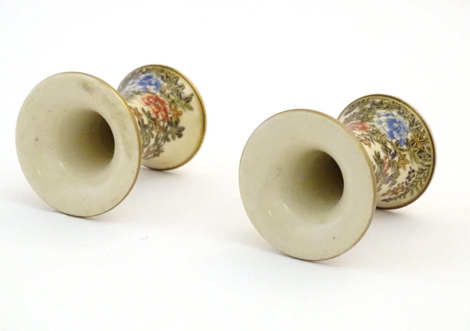 A pair of Japanese miniature Satsuma vases with flared rims and bases, decorated with flowers and - Image 5 of 8