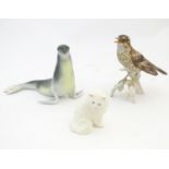 Three assorted models of animals comprising a Goebel model of a Song Thrush bird, a Royal Dux seal